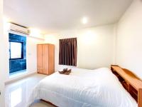 Postel nebo postele na pokoji v ubytování KOUAC VILLA - PATTAYA HOLIDAY HOUSE WALKING STREET 3 bedrooms