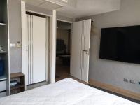 TV a/nebo společenská místnost v ubytování Centara Avenue 2 Bedrooms Pool View