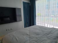 Postel nebo postele na pokoji v ubytování Centara Avenue 2 Bedrooms Pool View