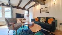 Telewizja i/lub zestaw kina domowego w obiekcie Appartement tout confort Vieux Tours avec parking privé 4p