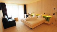 Łóżko lub łóżka w pokoju w obiekcie Hotel Obermoosburg