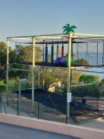 a batting cage with colorful balls in it at L&#39;arbre perché in Saint-Raphaël