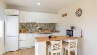 A kitchen or kitchenette at Campo del Abuelo Nerja by Ruralidays