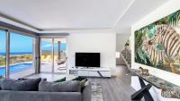 TV a/nebo společenská místnost v ubytování Villa Oceânica by LovelyStay