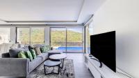 TV a/nebo společenská místnost v ubytování Villa Oceânica by LovelyStay