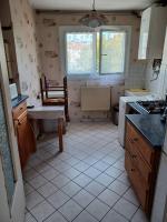 a kitchen with a sink and a stove top oven at Appartement T2 lumineux CHU Stade Gaston Gérard 2 nuits minimum in Dijon