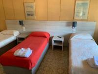 A bed or beds in a room at Cannone d'Oro