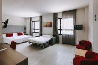 Posteľ alebo postele v izbe v ubytovaní Hotel K10