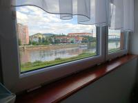 Výhled na řeku, která protéká v blízkosti apartmánu