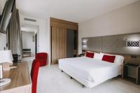 Posteľ alebo postele v izbe v ubytovaní Hotel K10