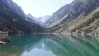 a lake in the middle of a valley with mountains at Bel appt 3 * plein Centre ville 4 pers. + balcon in Cauterets