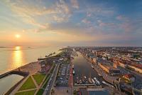 an aerial view of a city with a harbor at Atlantic Hotel Sail City in Bremerhaven