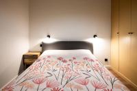A bed or beds in a room at Le Terrazzo - El&eacute;gant &amp; Cosy- Pentes de la Croix Rousse