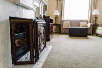 a hotel room with a fireplace and a living room at Hampton Inn & Suites Birmingham-Downtown-Tutwiler in Birmingham