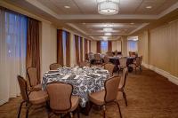 a conference room with tables and chairs in a room at Hampton Inn & Suites Birmingham-Downtown-Tutwiler in Birmingham