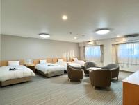 SUN PLAZA HOTEL 富士山中湖にあるベッド