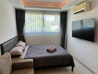 TV a/nebo společenská místnost v ubytování Laguna Beach Resort 2 Jomtien Beach