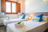 Posteľ alebo postele v izbe v ubytovaní Ideal Property Mallorca - Son Frau