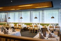 Un restaurante u otro lugar para comer en JUFA Hotel Malbun