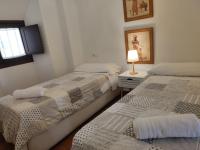 Posteľ alebo postele v izbe v ubytovaní Apartamento San Fernando