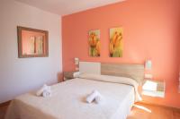 Postel nebo postele na pokoji v ubytování Villa Primavera V130 By MENORCARENTALS