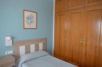 Postel nebo postele na pokoji v ubytování Villa Primavera V130 By MENORCARENTALS