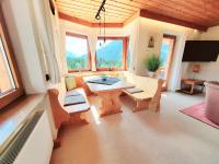 Televízia a/alebo spoločenská miestnosť v ubytovaní Schickster Sky Lodge
