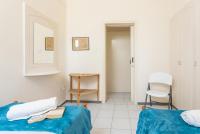 Postel nebo postele na pokoji v ubytování Villa Anemone