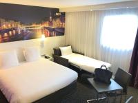 Hôtel Mercure Lyon Centre Charpennes Parc de la Tête d'Orにあるベッド