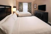Hilton Grand Vacations Club Tuscany Village Orlandoにあるベッド