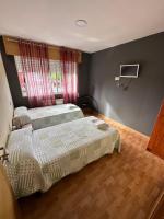 A bed or beds in a room at Mirador De Rouris