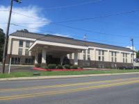 a large building on the side of a street at Hampton Inn El Dorado in El Dorado