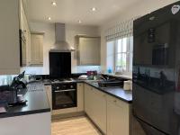 Kuchyň nebo kuchyňský kout v ubytování Sea Urchins Cottage at The Bay Filey, sleeps 4-5, 2 dogs welcome for free too