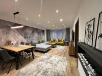 A seating area at LUX apartmany Romantika CHOPOK 7, 19