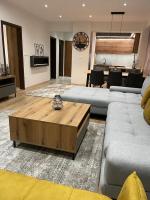 A seating area at LUX apartmany Romantika CHOPOK 7, 19