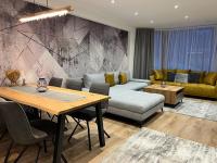 A seating area at LUX apartmany Romantika CHOPOK 7, 19
