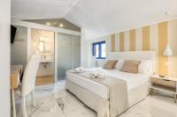 Posteľ alebo postele v izbe v ubytovaní Spagna Dream Suites