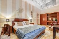 Posteľ alebo postele v izbe v ubytovaní Spagna Dream Suites