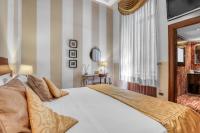 Posteľ alebo postele v izbe v ubytovaní Spagna Dream Suites