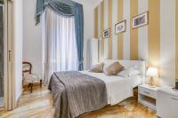 Posteľ alebo postele v izbe v ubytovaní Spagna Dream Suites