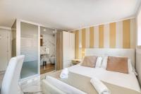 Posteľ alebo postele v izbe v ubytovaní Spagna Dream Suites