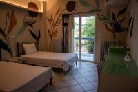 A bed or beds in a room at Ιlias rooms