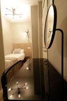 Postel nebo postele na pokoji v ubytování SUITES YOU Gran Vía