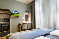 Łóżko lub łóżka w pokoju w obiekcie Vayalen Boutique Hotel