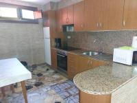 Kuchyň nebo kuchyňský kout v ubytování Casa con piscina al lado del mar en Viladesuso