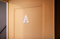 a sign on the elevator door of a building at Perpignan - Appartement en centre ville in Perpignan