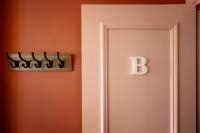 a bathroom door with the letter b on it at Perpignan - Appartement en centre ville in Perpignan