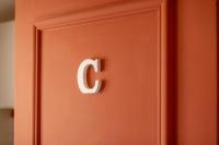 a light switch with the letter c on it at Perpignan - Appartement en centre ville in Perpignan