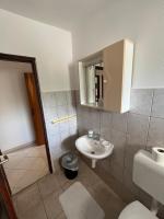 Kúpeľňa v ubytovaní Apartments Edina