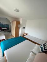 Posteľ alebo postele v izbe v ubytovaní Apartments Edina
